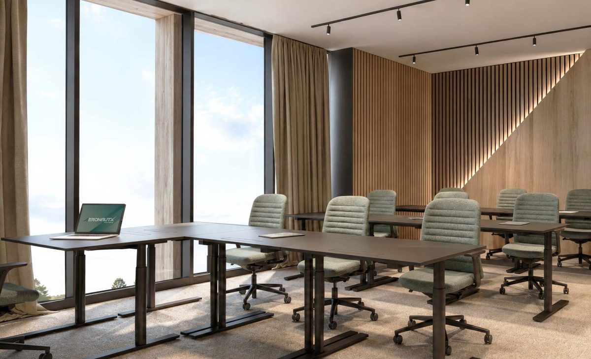 Modern training classroom with flexible workstations, ergonomic seating, floor-to-ceiling windows, and warm wood-accented interiors designed for professional learning and collaboration.